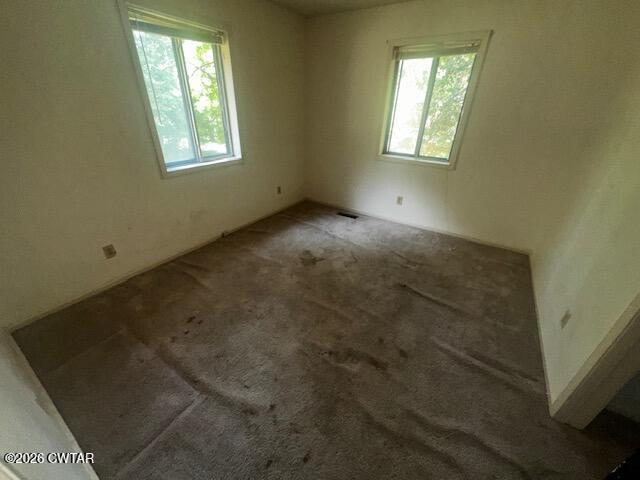 1400 Roper Road Bolivar, TN 38008 - Photo 12 of 23 an empty room with windows