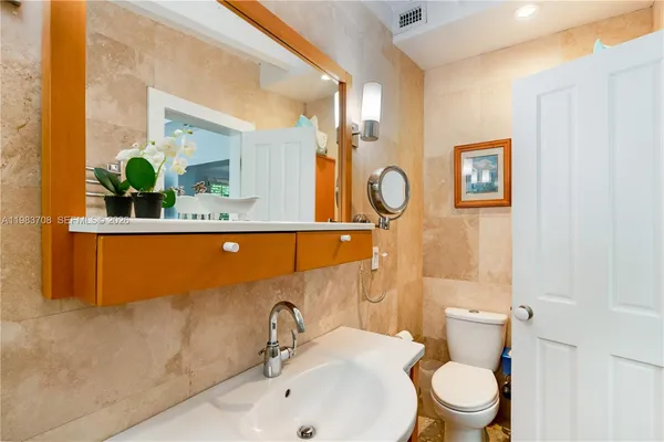 $3,400,000 | 310 Greenwood Drive, Key Biscayne, FL 33149