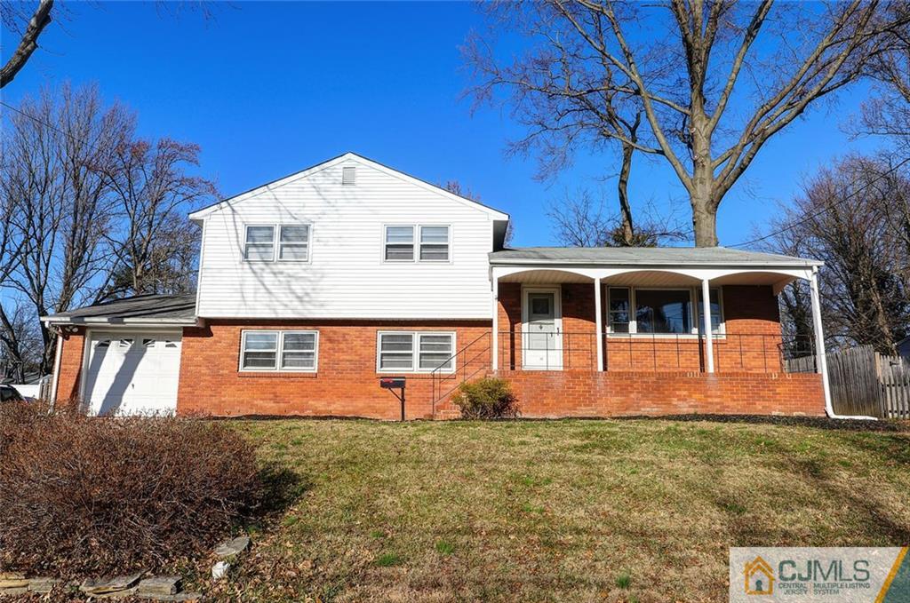 20 Barnett Road Lawrence Township, NJ 08648 - Photo 2 of 27 a front view of a house with garden