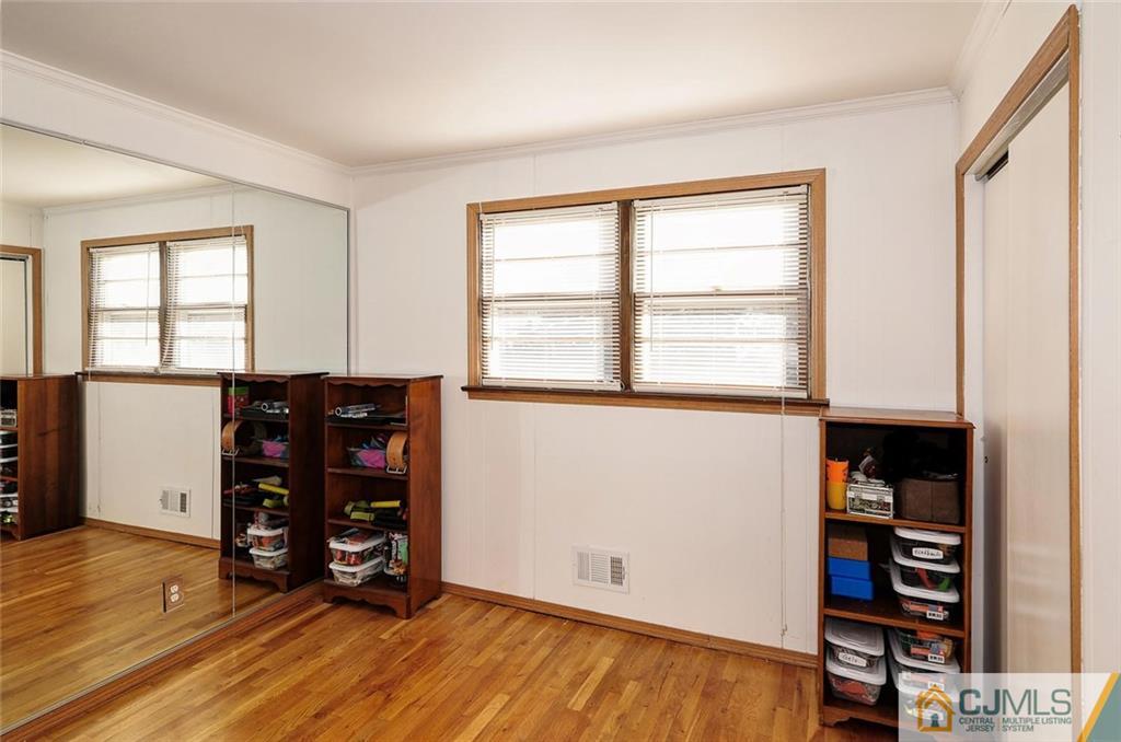 20 Barnett Road Lawrence Township, NJ 08648 - Photo 19 of 27 an empty room with wooden floor and closet