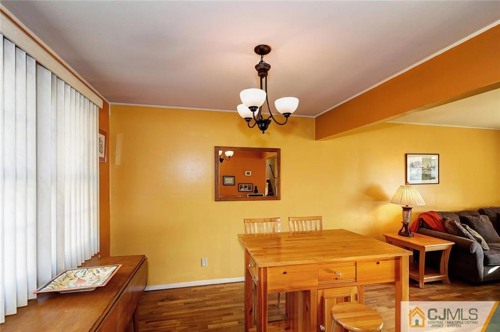 20 Barnett Road Lawrence Township, NJ 08648 - Photo 9 of 27 a dining room with a table and chairs
