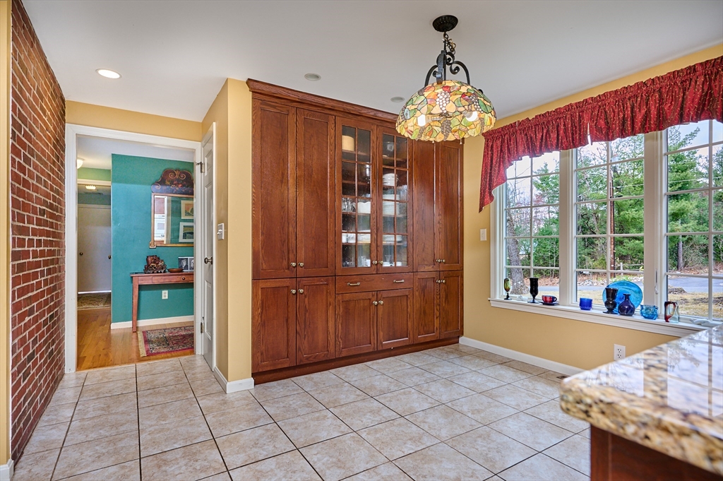 33 Echo Hill Road Amherst, MA 01002 - Photo 15 of 37 a very nice looking room with a large window and chandelier