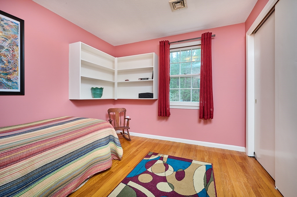 33 Echo Hill Road Amherst, MA 01002 - Photo 20 of 37 a bedroom with a bed and a window
