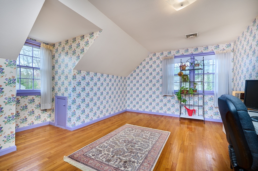 33 Echo Hill Road Amherst, MA 01002 - Photo 24 of 37 a living room with a couch and a rug