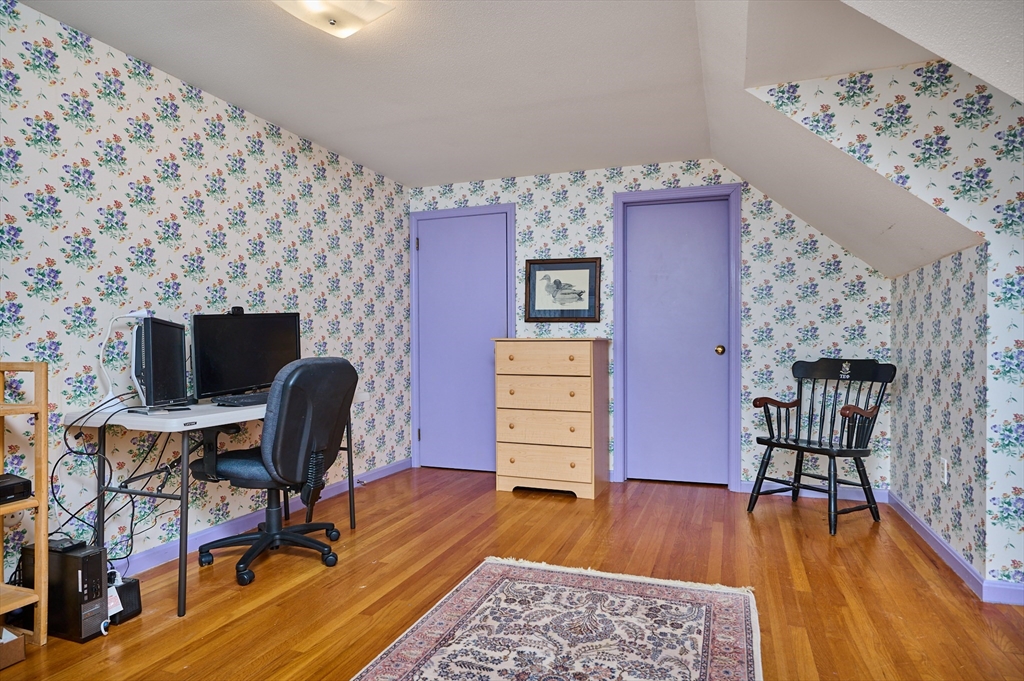 33 Echo Hill Road Amherst, MA 01002 - Photo 25 of 37 a view of a workspace with furniture and wooden floor