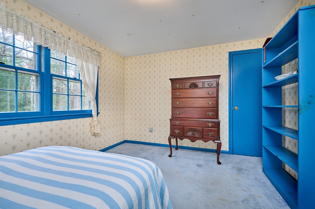 33 Echo Hill Road Amherst, MA 01002 - Photo 26 of 37 a bedroom with a bed and a window