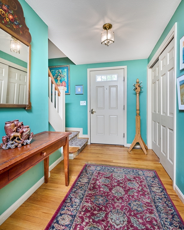 33 Echo Hill Road Amherst, MA 01002 - Photo 3 of 37 a living room with furniture and a rug