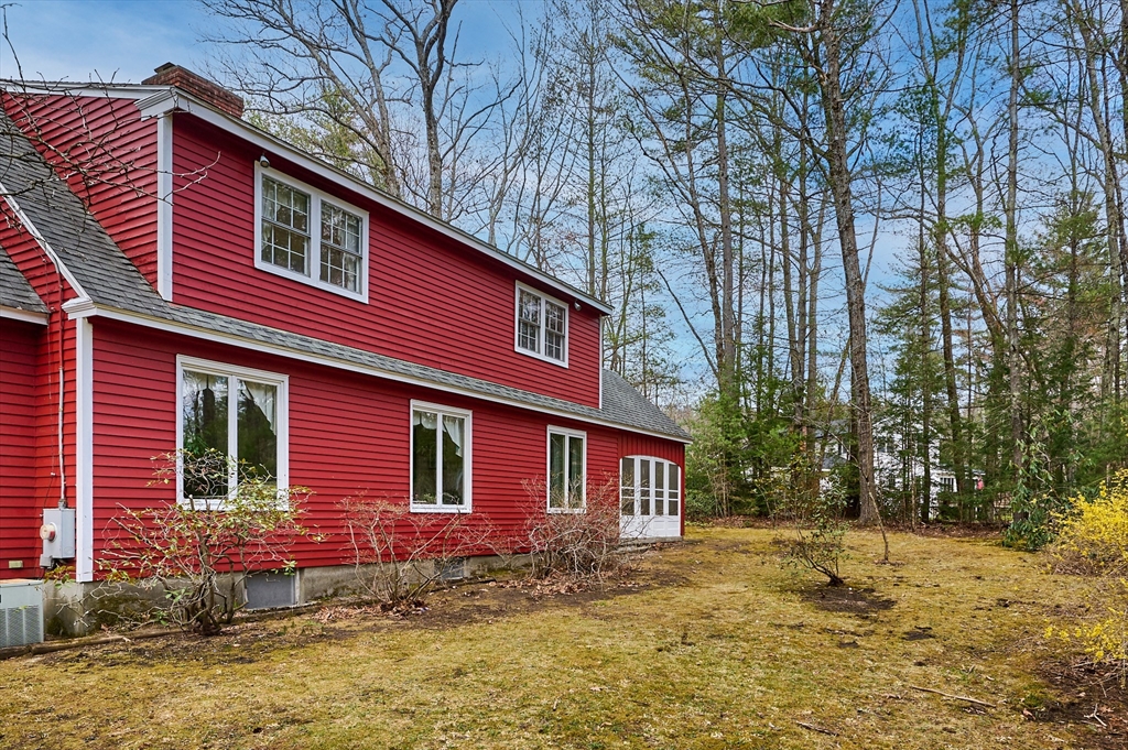 33 Echo Hill Road Amherst, MA 01002 - Photo 32 of 37 a front view of a house with a yard