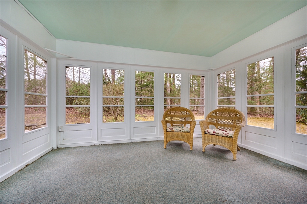 33 Echo Hill Road Amherst, MA 01002 - Photo 9 of 37 a living room with furniture and large windows