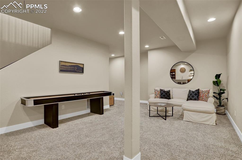 1435 Catnap Lane Monument, CO 80132 - Photo 32 of 47 a view of a hallway with seating area and entryway