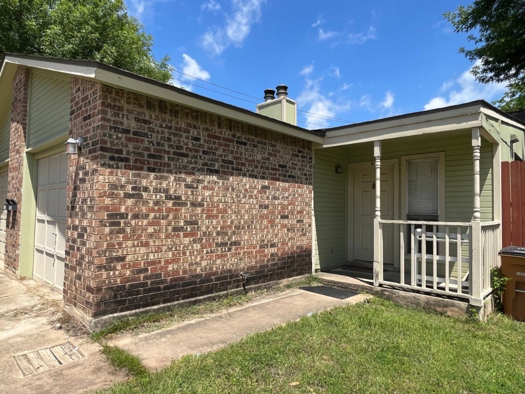 a front view of a house with a garage