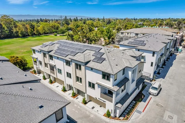 an aerial view of a house with a outdoor space