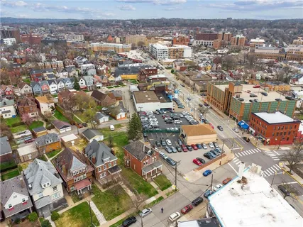 an aerial view of a city with lots of residential buildings