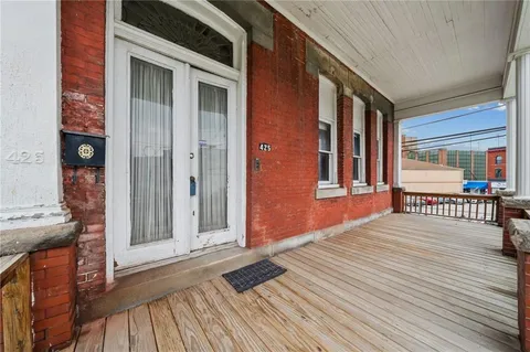 a balcony view with a outdoor space