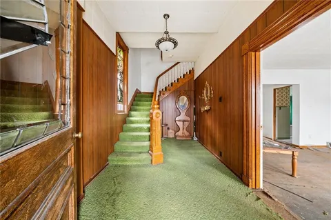 a view of an entryway with staircase