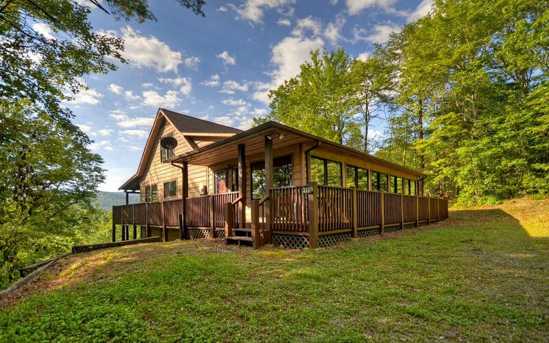 213 East Overbend Trail Blue Ridge, GA 30513 - Photo 1 of 1 a view of a house with a yard and deck