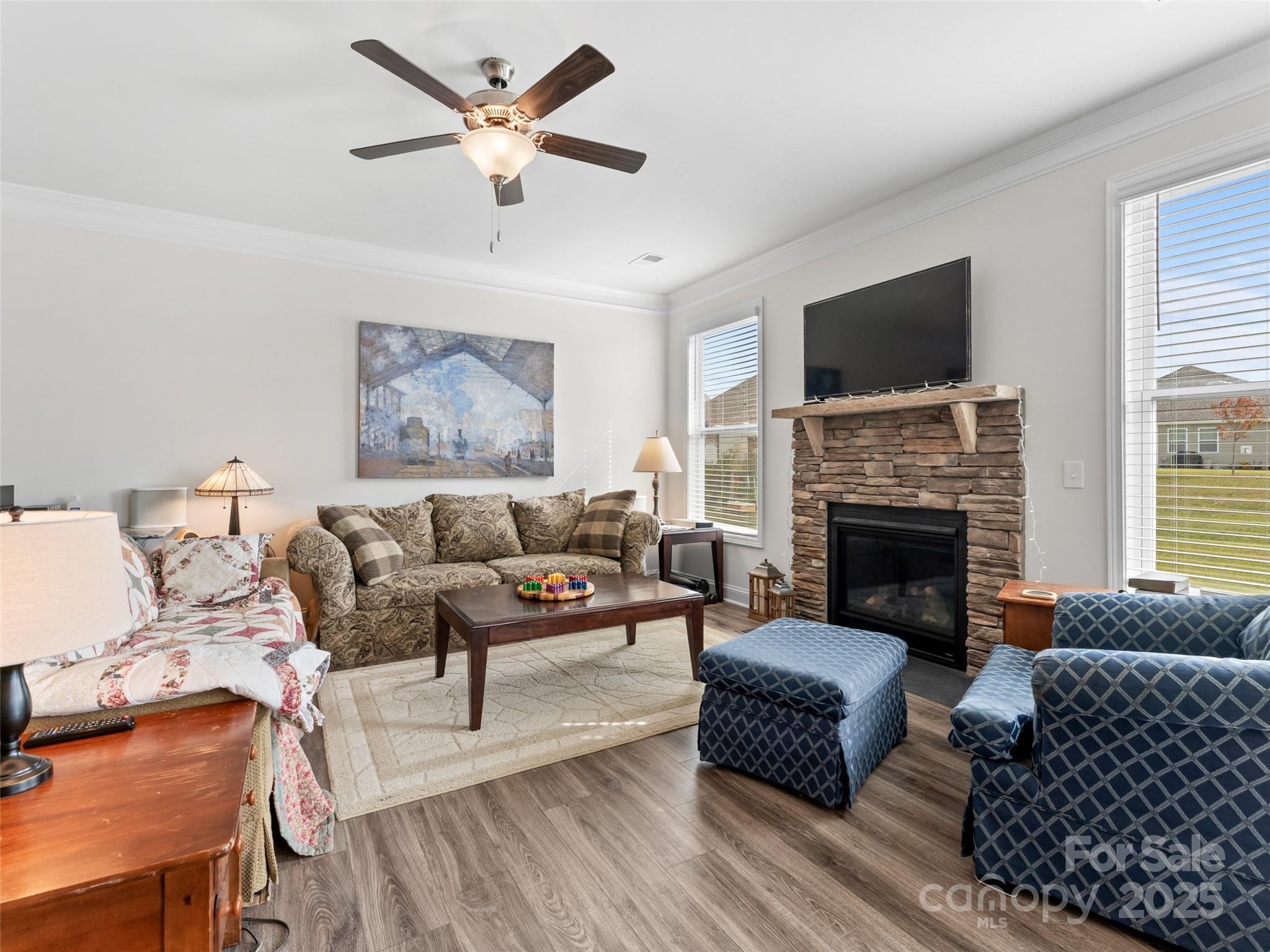 108 Thornberry Road Hendersonville, NC 28792 - Photo 11 of 42 a living room with furniture fireplace and flat screen tv