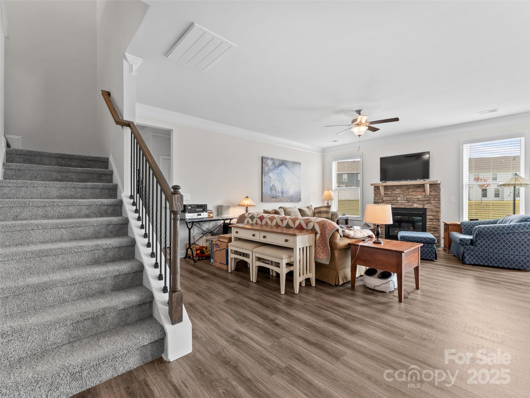 108 Thornberry Road Hendersonville, NC 28792 - Photo 15 of 42 a living room with furniture and a fireplace