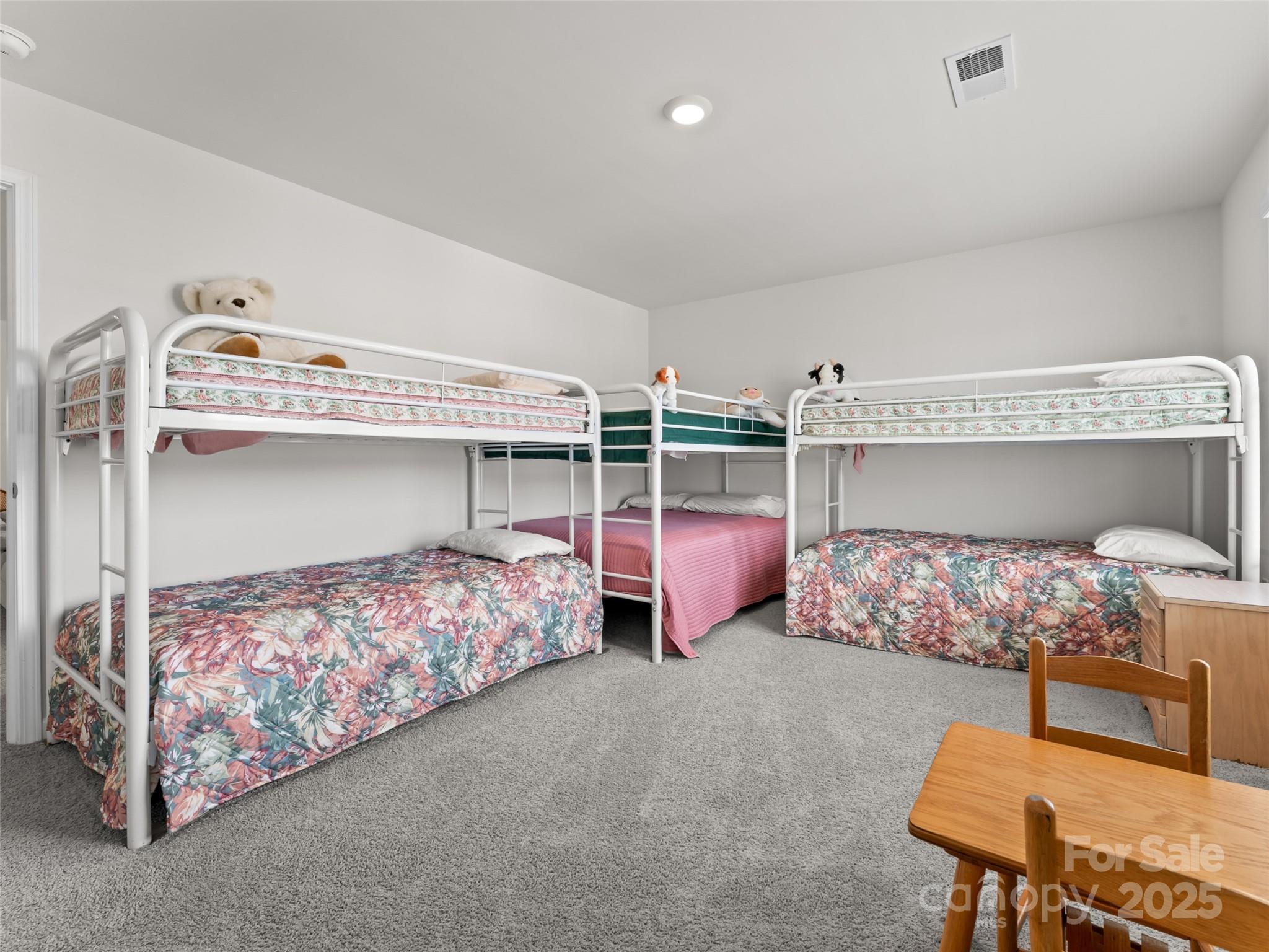 108 Thornberry Road Hendersonville, NC 28792 - Photo 18 of 42 a bedroom with bed and window