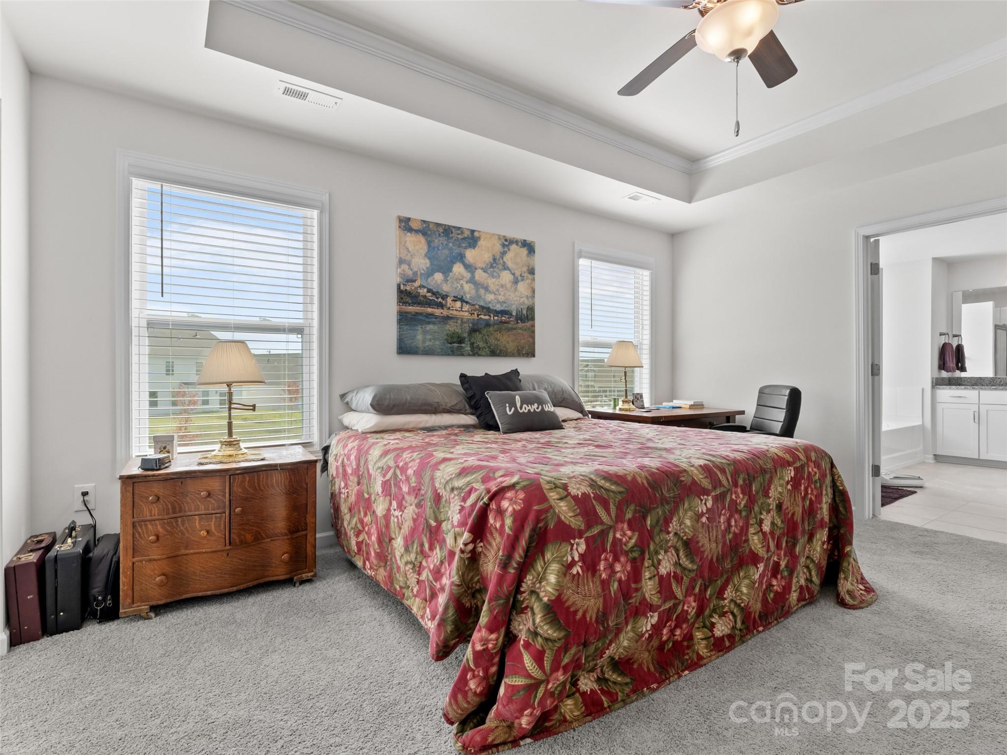 108 Thornberry Road Hendersonville, NC 28792 - Photo 21 of 42 a bedroom with a bed and window