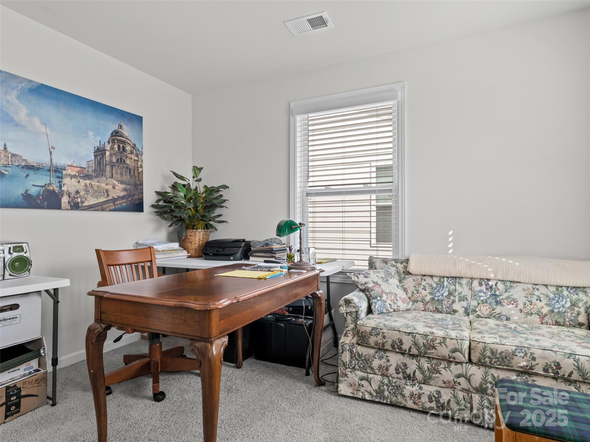 108 Thornberry Road Hendersonville, NC 28792 - Photo 22 of 42 a living room with furniture and a window