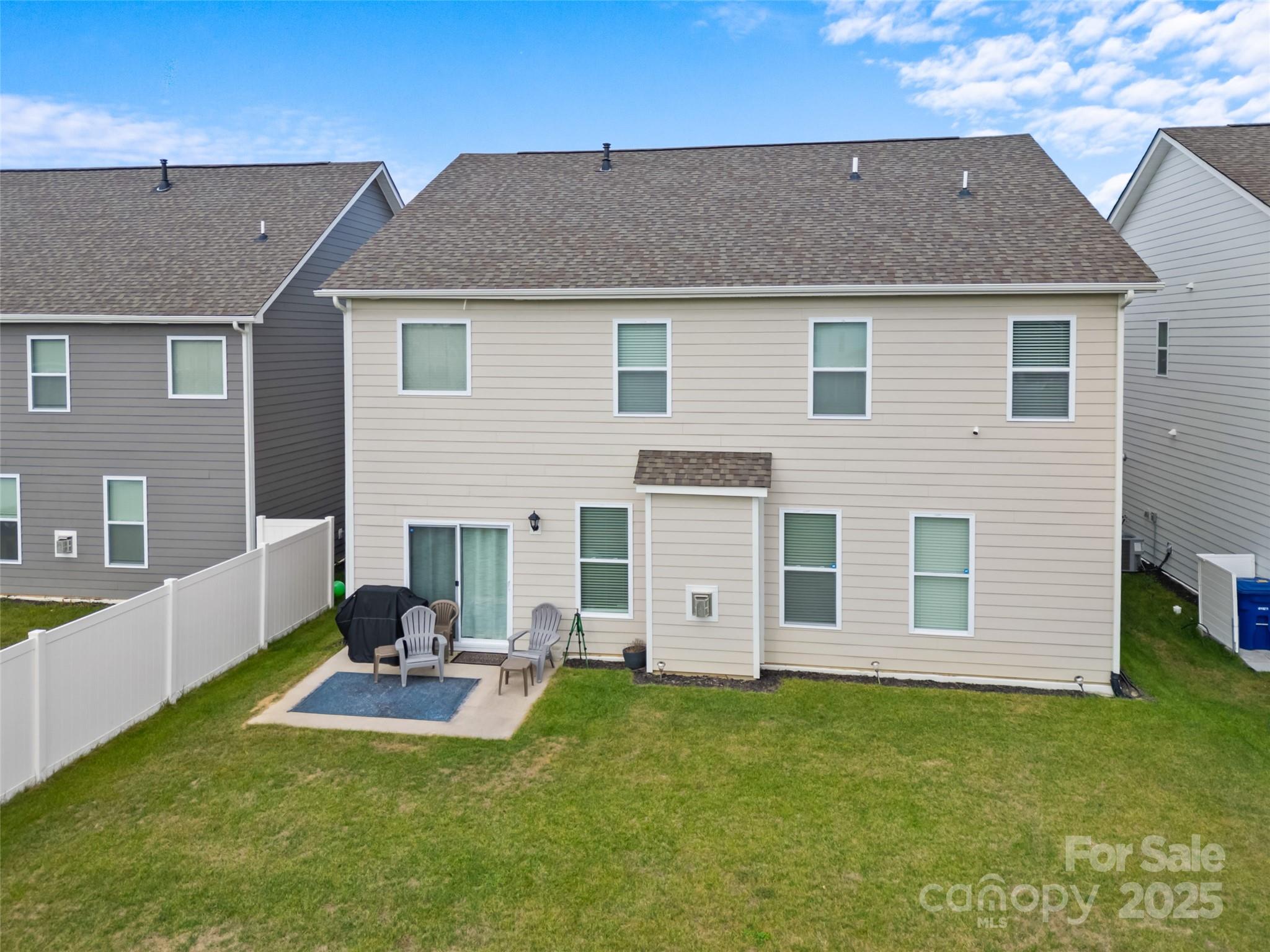 108 Thornberry Road Hendersonville, NC 28792 - Photo 31 of 42 a view of a house with a backyard