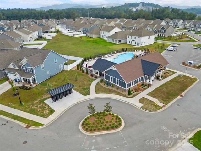 a front view of a house with a yard and porch