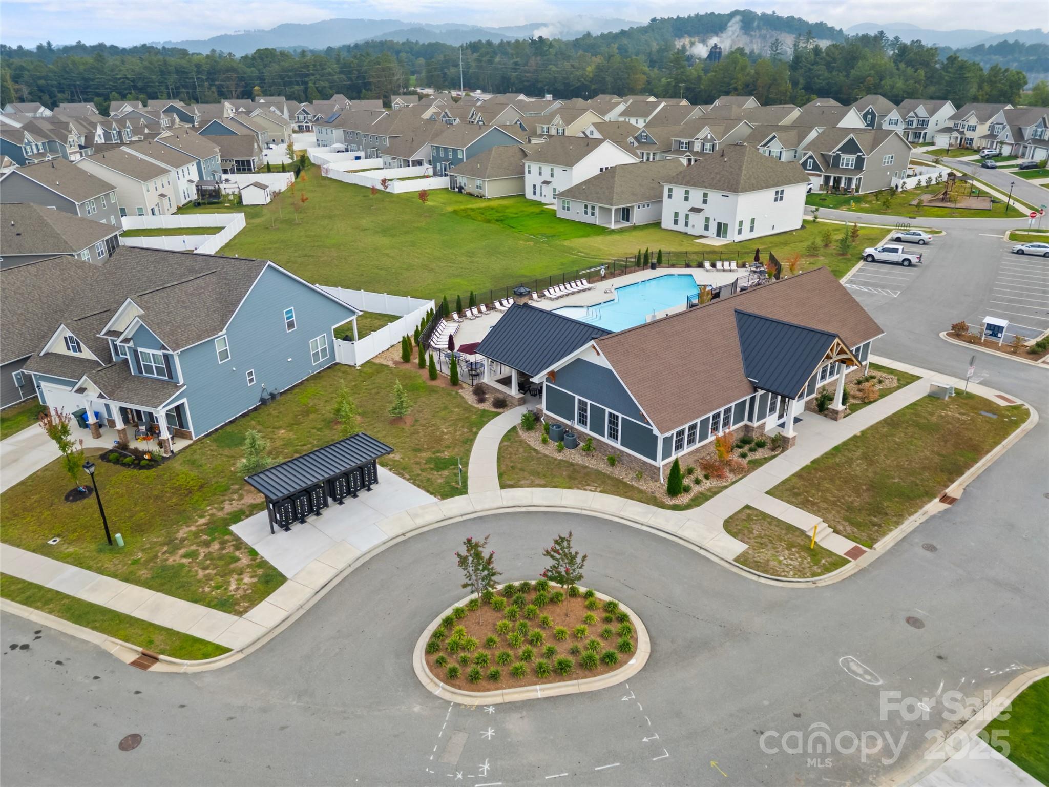 108 Thornberry Road Hendersonville, NC 28792 - Photo 37 of 42 an aerial view of a house with a swimming pool