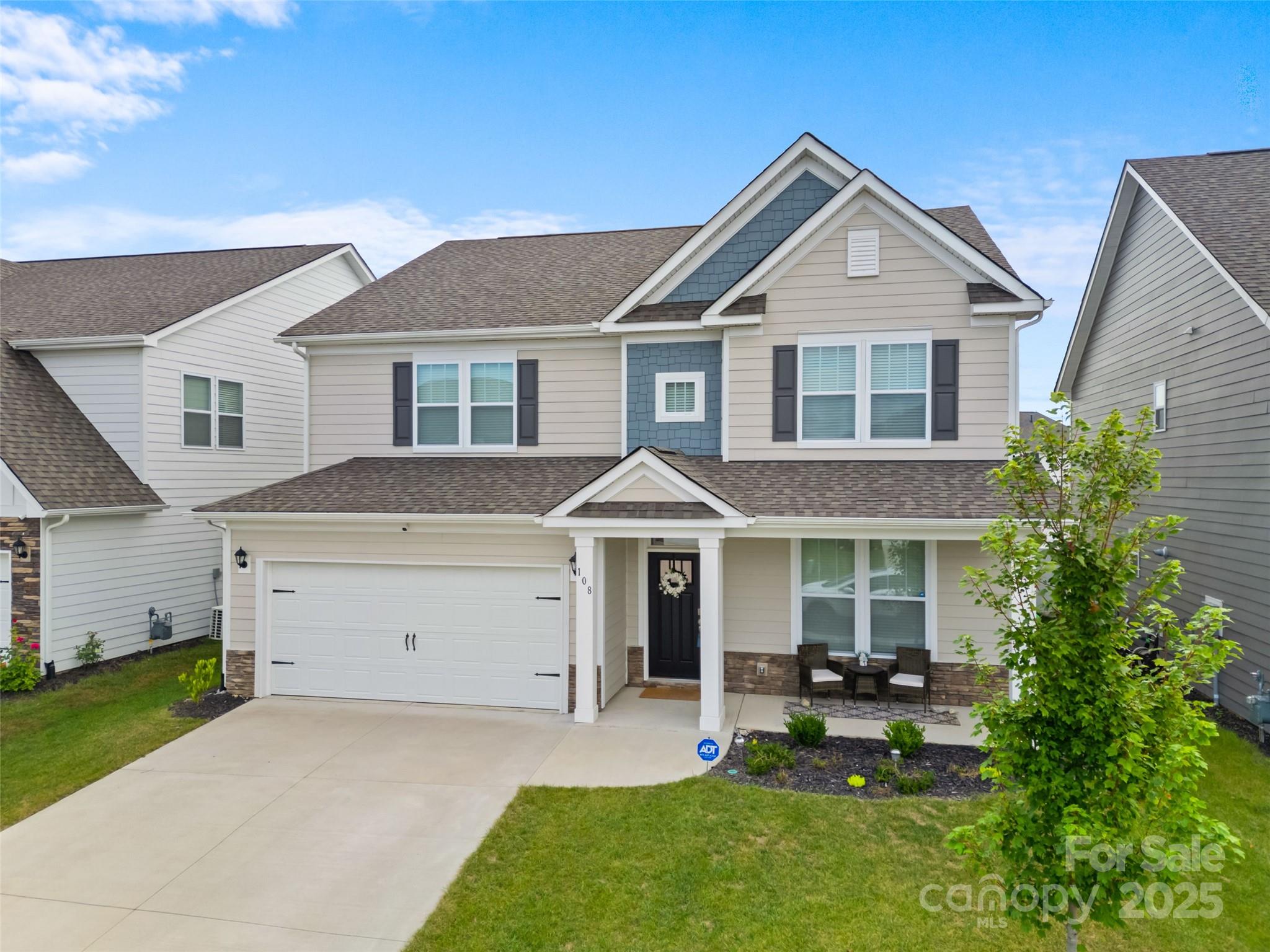 108 Thornberry Road Hendersonville, NC 28792 - Photo 38 of 42 a front view of a house with a yard and porch