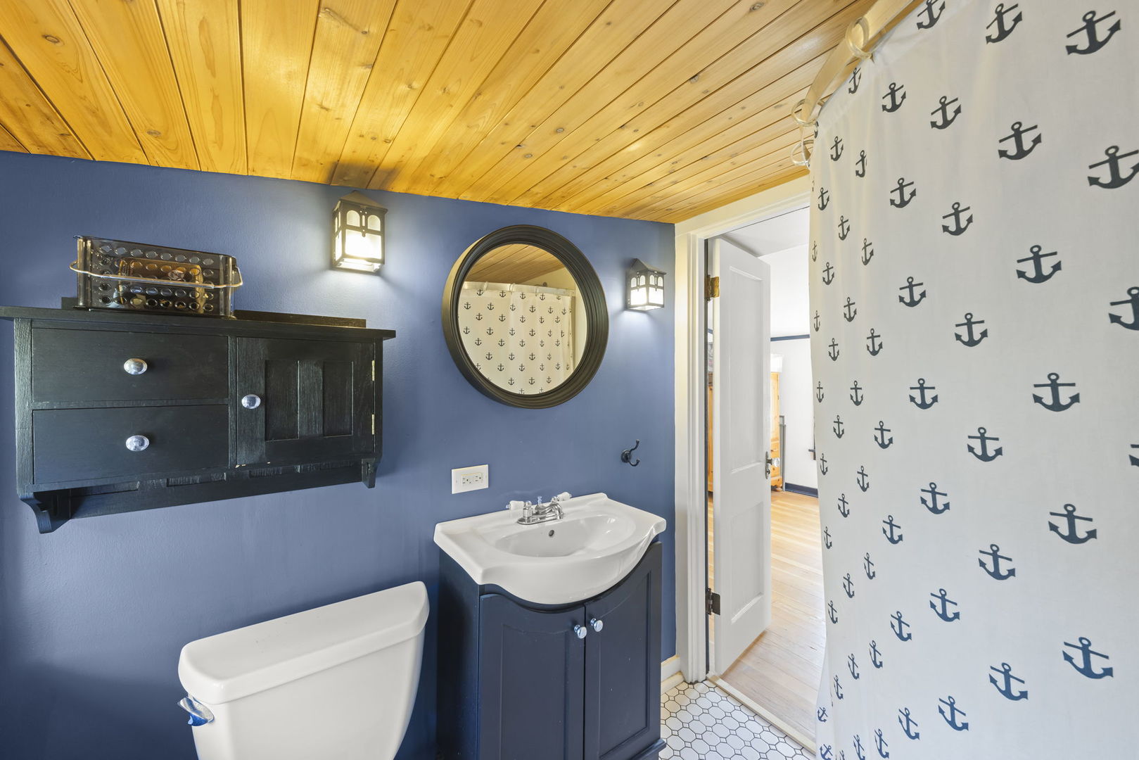 1750 Olive Road Homewood, IL 60430 - Photo 26 of 35 a bathroom with a toilet a sink and a mirror