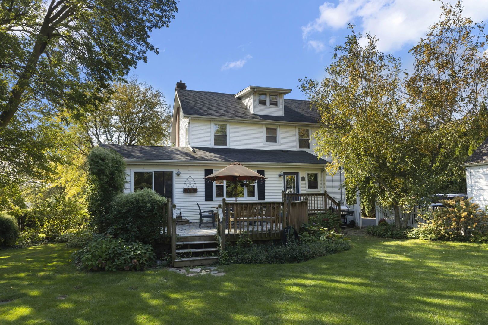 1750 Olive Road Homewood, IL 60430 - Photo 31 of 35 a front view of a house with a garden