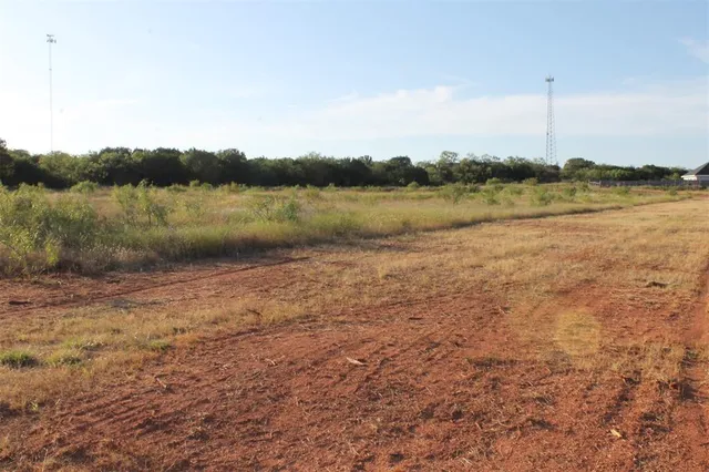 a view of lake with green space