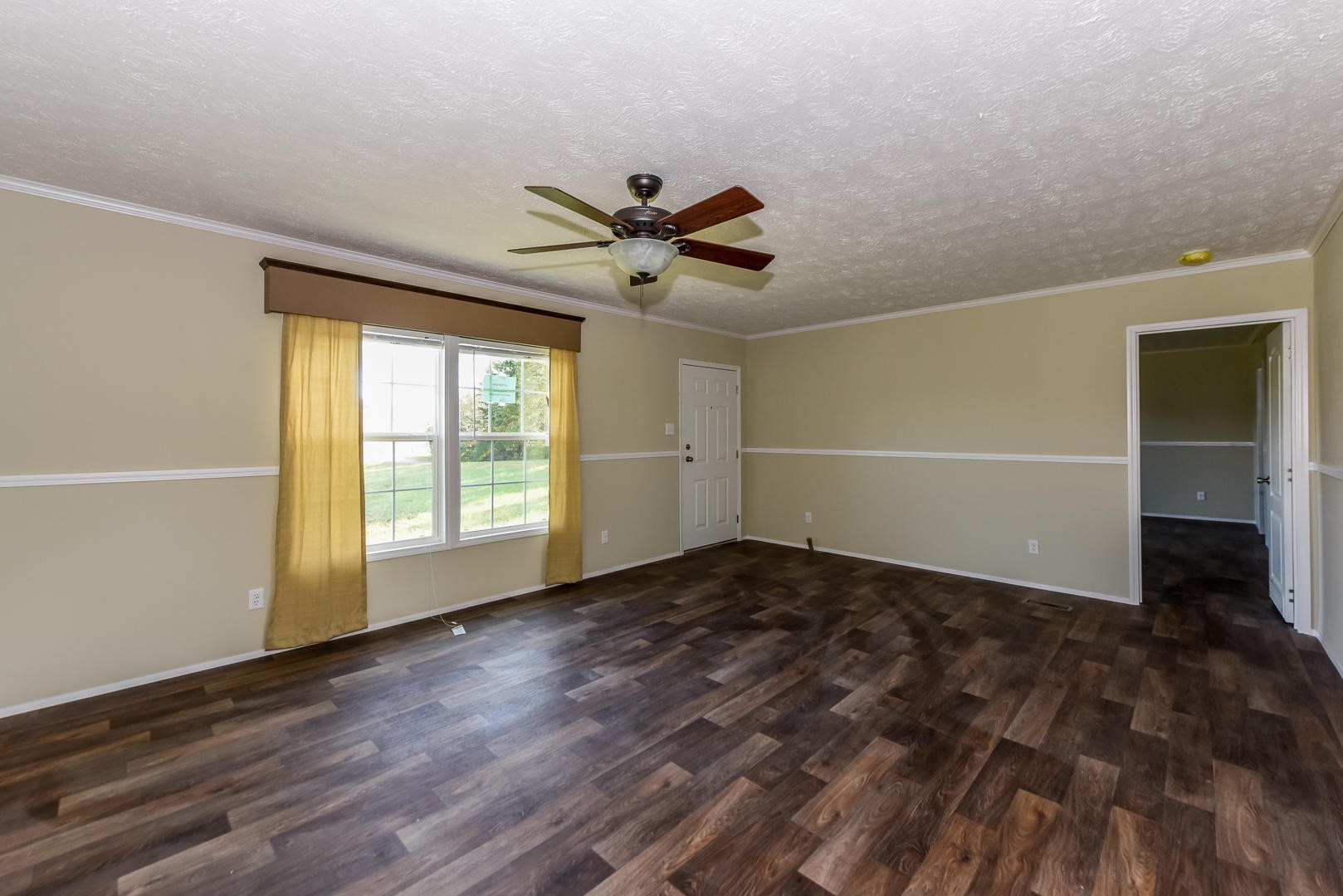 207 South Springview Road Maryville, TN 37801 - Photo 4 of 34 a view of a room with a ceiling fan and hardwood floor