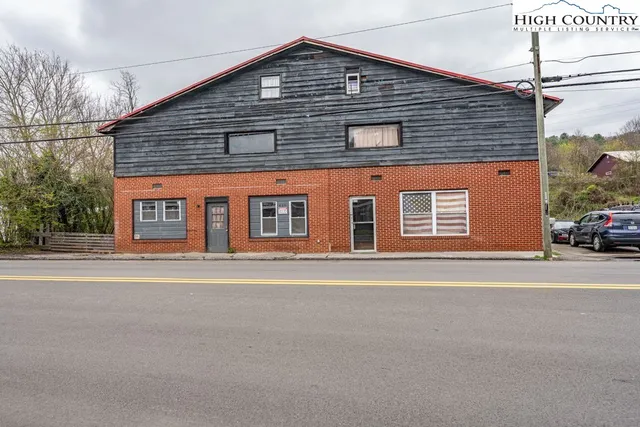 front view of a house with a white house