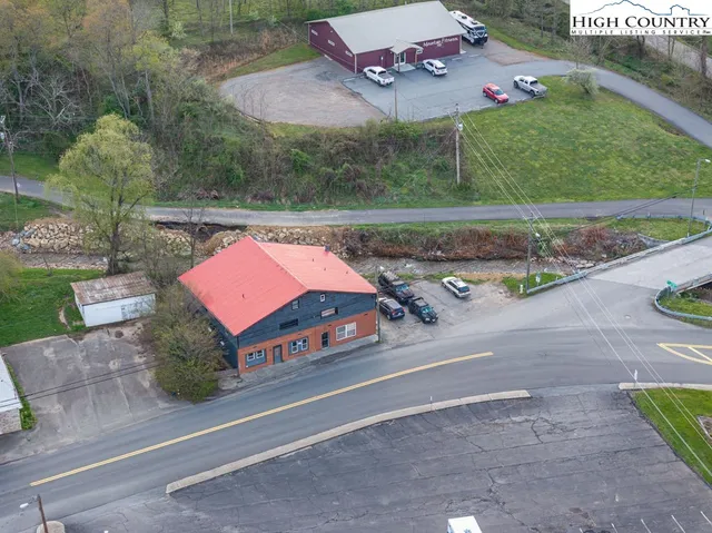an aerial view of a house with a garden
