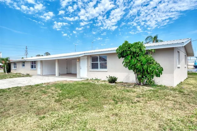 a house view with a garden space