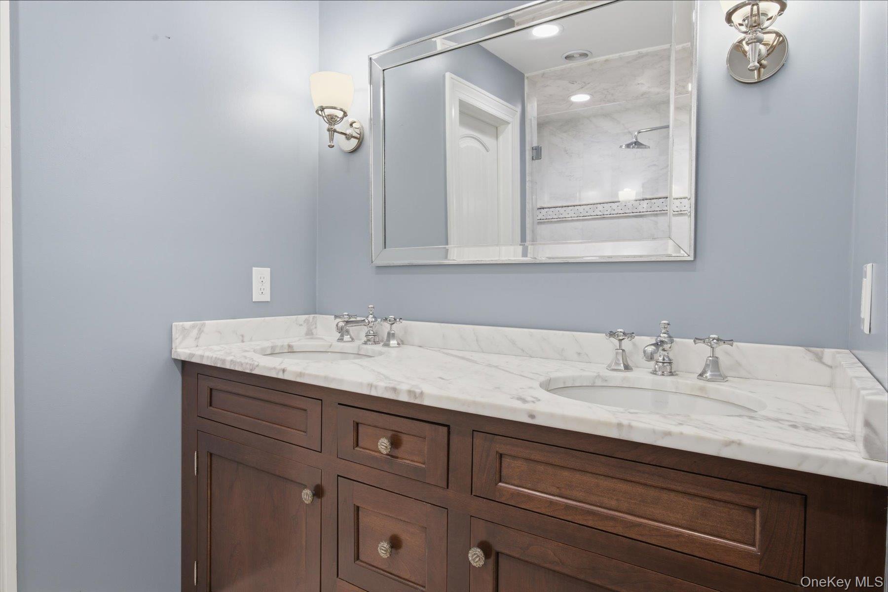 134 Sandy Hollow Road Northport, NY 11768 - Photo 13 of 28 Carrara marble finishes and timeless custom cabinetry.
