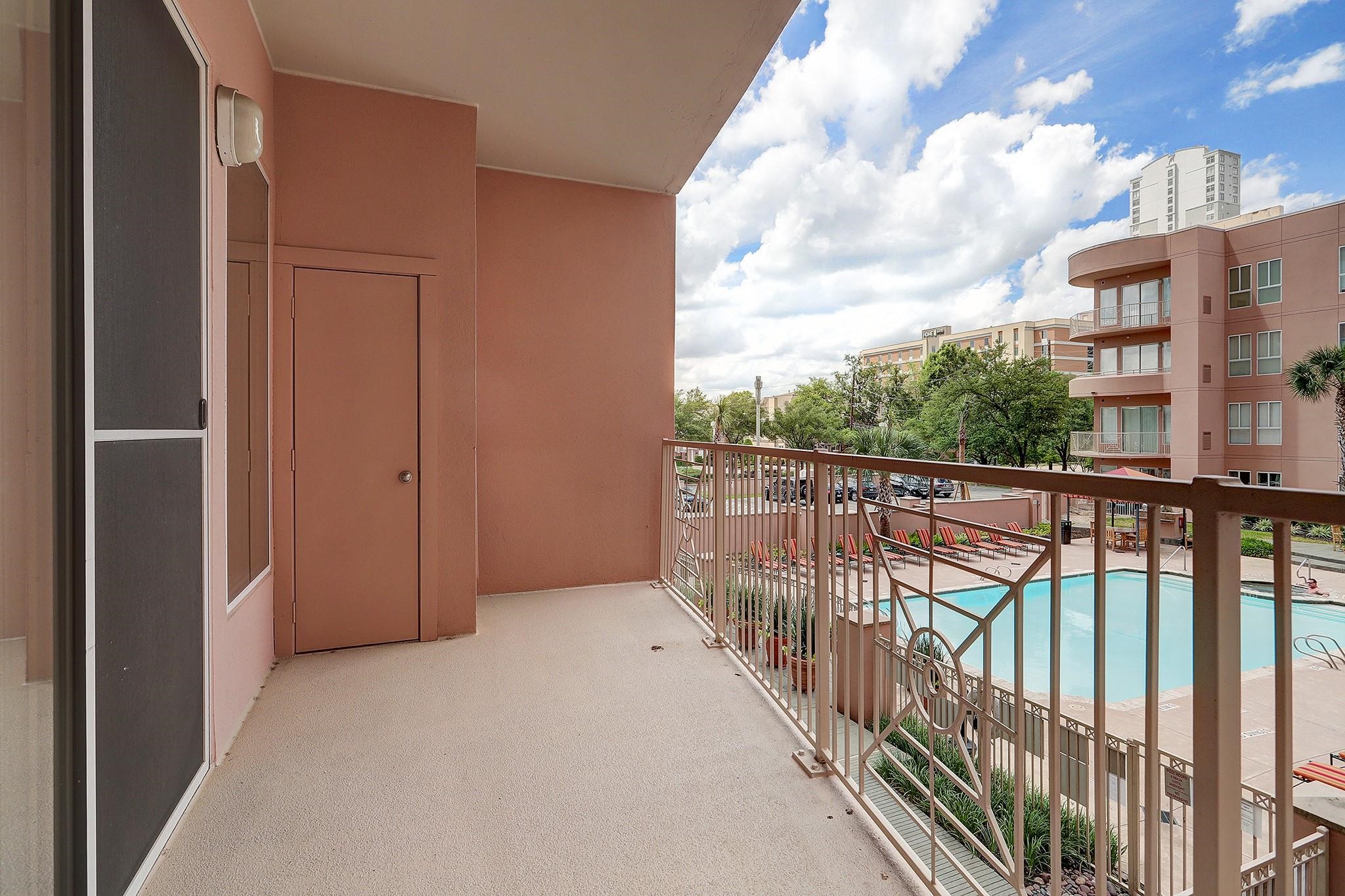 3505 Sage Road, Unit 207 Houston, TX 77056 - Photo 15 of 21 Relax on a private balcony with gorgeous views overlooking the pool.