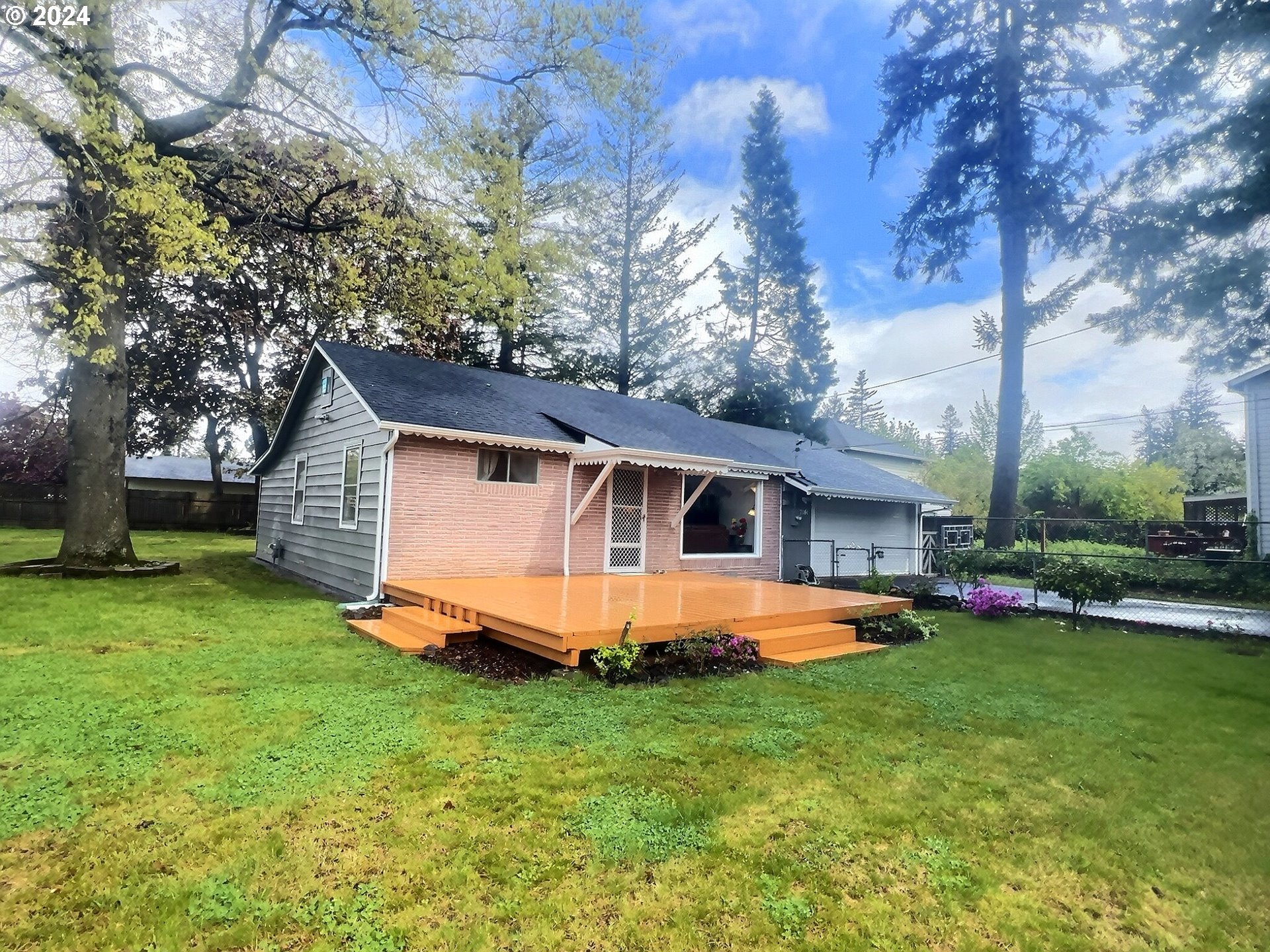 17141 Southeast Stephens Street Portland, OR 97233 - Photo 2 of 27 a front view of house with yard and green space