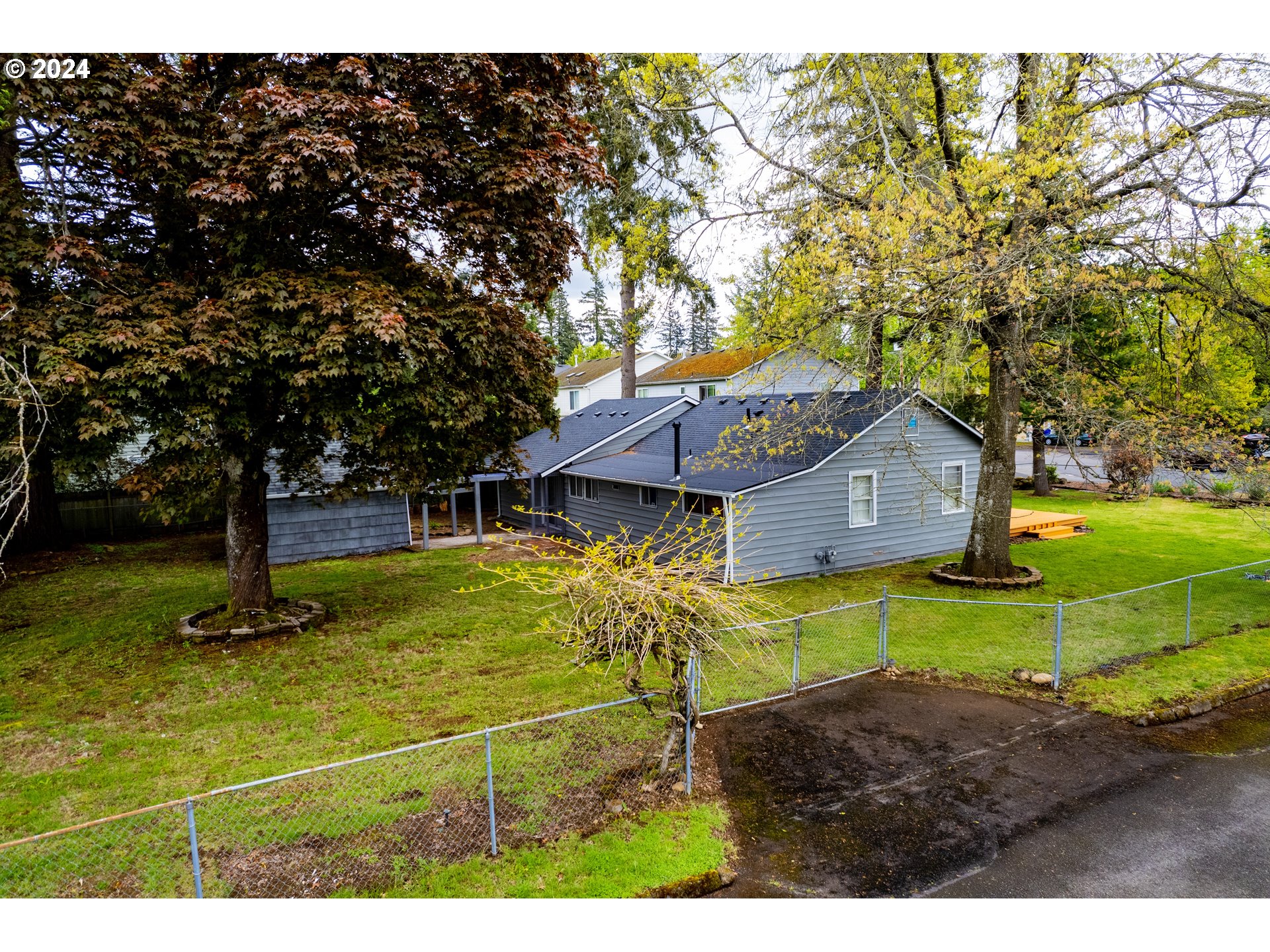 17141 Southeast Stephens Street Portland, OR 97233 - Photo 22 of 27 a view of a house with a yard