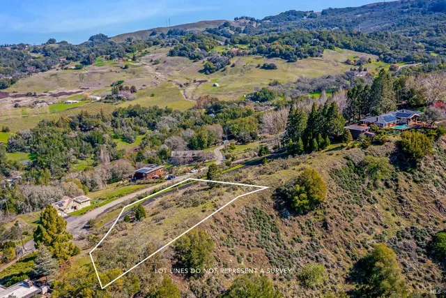 a view of a city with mountains in the background