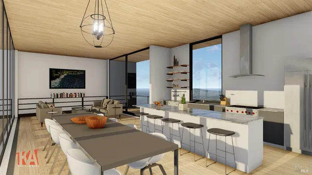 a kitchen with a stove a sink dishwasher a dining table and chairs with wooden floor