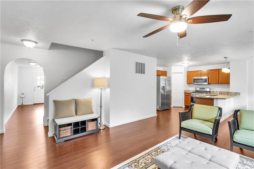 6439 Lindsey Lane Export, PA 15632 - Photo 11 of 39 a living room with furniture and a flat screen tv