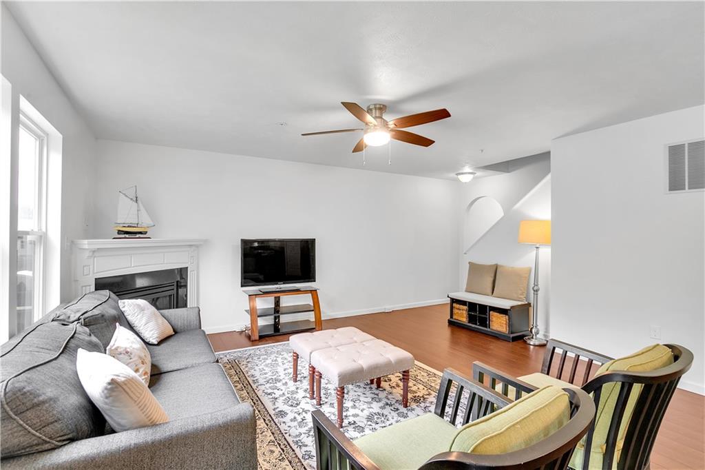 6439 Lindsey Lane Export, PA 15632 - Photo 15 of 39 a living room with furniture and a flat screen tv