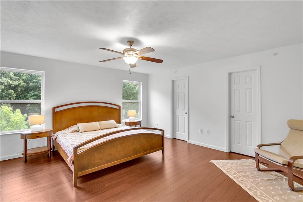 6439 Lindsey Lane Export, PA 15632 - Photo 23 of 39 a bedroom with a bed and a large window