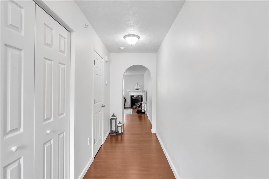 6439 Lindsey Lane Export, PA 15632 - Photo 9 of 39 a view of a hallway view with wooden floor and staircase