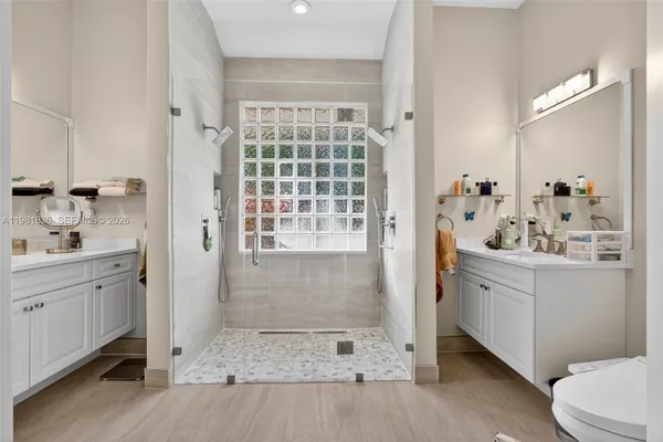 a bathroom with sink and mirror