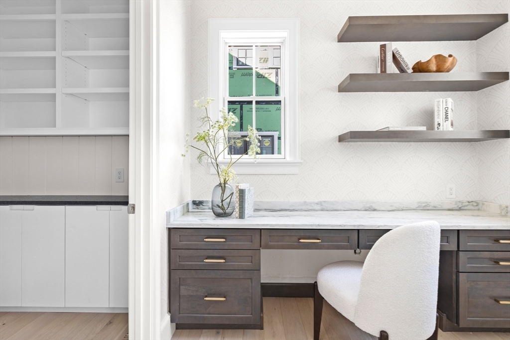 8 Common Court, Unit 8 Lexington, MA 02421 - Photo 7 of 17 a kitchen with a sink a window and cabinets