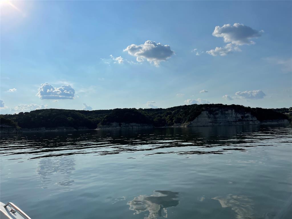 Tbd 7th Street Whitney, TX 76692 - Photo 2 of 4 a view of a lake in a field
