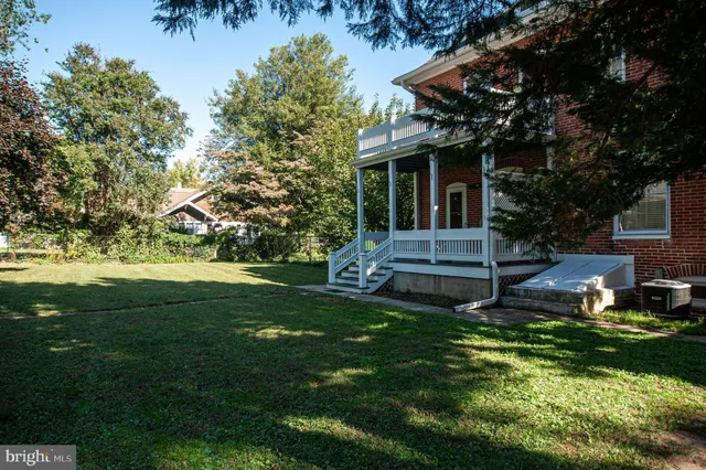 a front view of a house with a porch